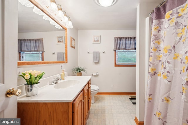 1318 Morgan Ave, Cinnaminson, NJ 08077 - full bathroom with vanity, tile patterned floors, plenty of natural light, and a shower with curtain