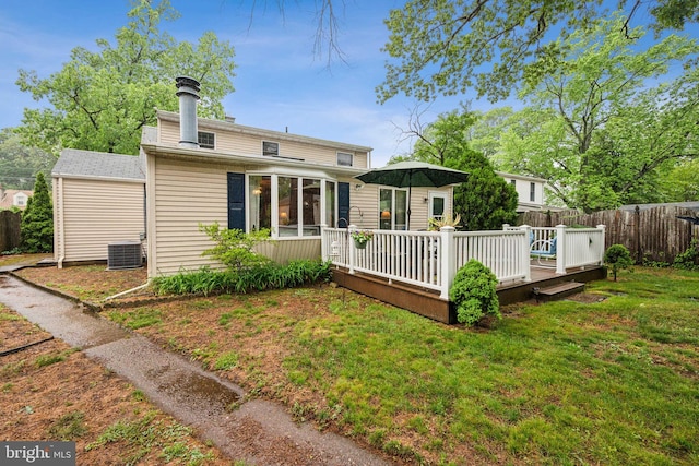 1318 Morgan Ave, Cinnaminson, NJ 08077 - back of property with a wooden deck and a chimney
