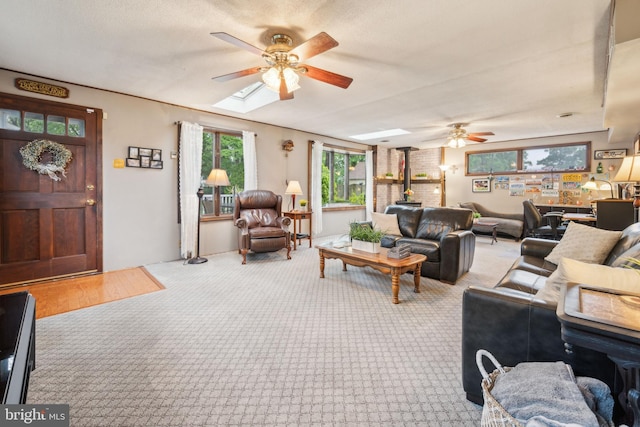 1318 Morgan Ave, Cinnaminson, NJ 08077 - living area featuring a ceiling fan, carpet, and a skylight