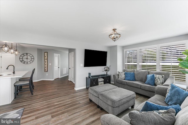 300 Hayward Ct, Pottstown, PA 19464 - living room featuring wood finished floors and a chandelier