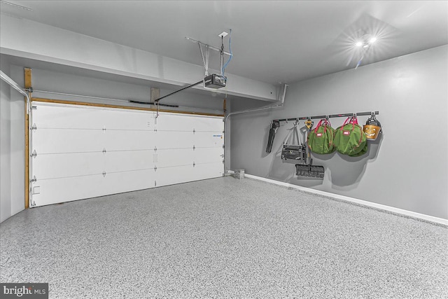 300 Hayward Ct, Pottstown, PA 19464 - garage featuring a garage door opener and baseboards