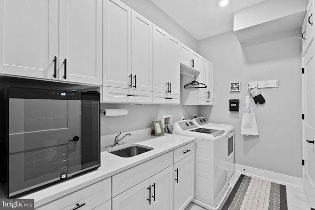 44691 Wellfleet Dr Unit 306, Ashburn, VA 20147 - laundry room featuring washing machine and clothes dryer, cabinet space, and recessed lighting