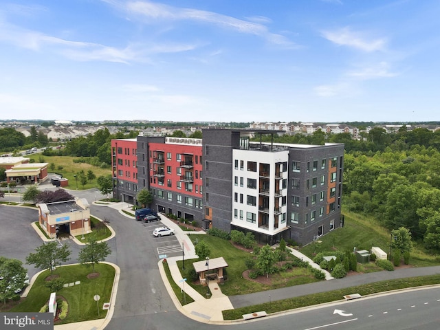 44691 Wellfleet Dr Unit 306, Ashburn, VA 20147 - view of property featuring uncovered parking