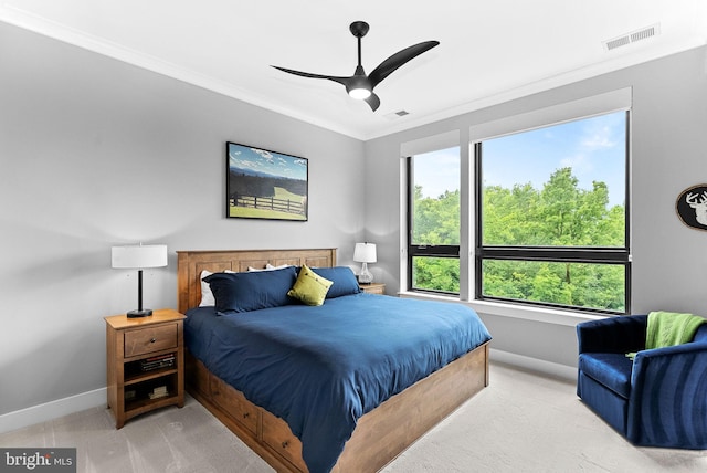 44691 Wellfleet Dr Unit 306, Ashburn, VA 20147 - bedroom with ornamental molding, a ceiling fan, and light colored carpet