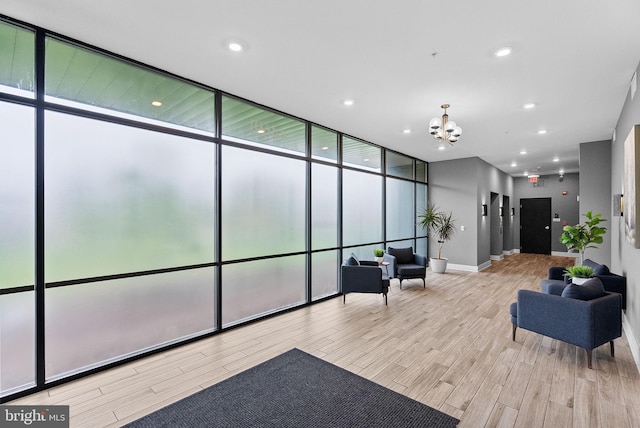 44691 Wellfleet Dr Unit 306, Ashburn, VA 20147 - building lobby featuring expansive windows and recessed lighting