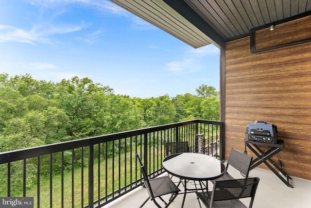 44691 Wellfleet Dr Unit 306, Ashburn, VA 20147 - balcony featuring area for grilling and a forest view