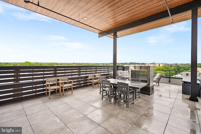 44691 Wellfleet Dr Unit 306, Ashburn, VA 20147 - view of patio / terrace featuring outdoor dining area