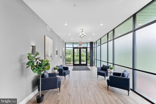 44691 Wellfleet Dr Unit 306, Ashburn, VA 20147 - lobby featuring floor to ceiling windows and recessed lighting