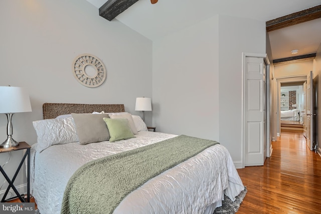 12 S Castle St, Baltimore, MD 21231 - bedroom featuring beam ceiling and wood finished floors