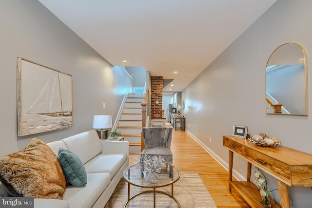 12 S Castle St, Baltimore, MD 21231 - living area featuring stairway, wood finished floors, and recessed lighting