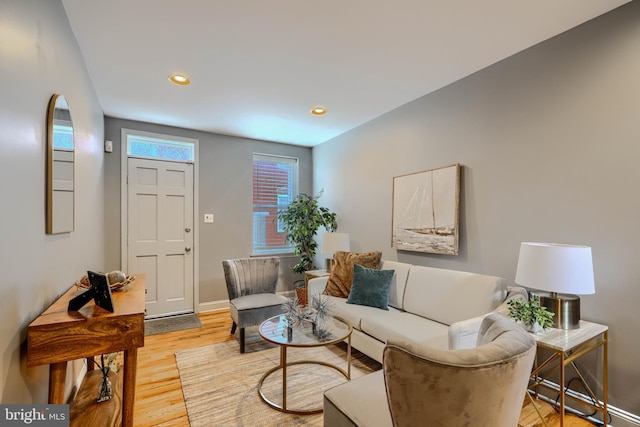 12 S Castle St, Baltimore, MD 21231 - living room with light wood finished floors and recessed lighting
