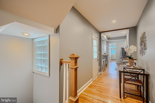 12 S Castle St, Baltimore, MD 21231 - hallway with light wood-type flooring, recessed lighting, and an upstairs landing