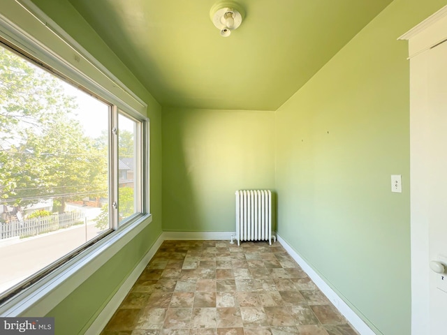 2636 Rhode Island Ave NE, Washington, DC 20018 - additional living space featuring radiator and stone finish floors
