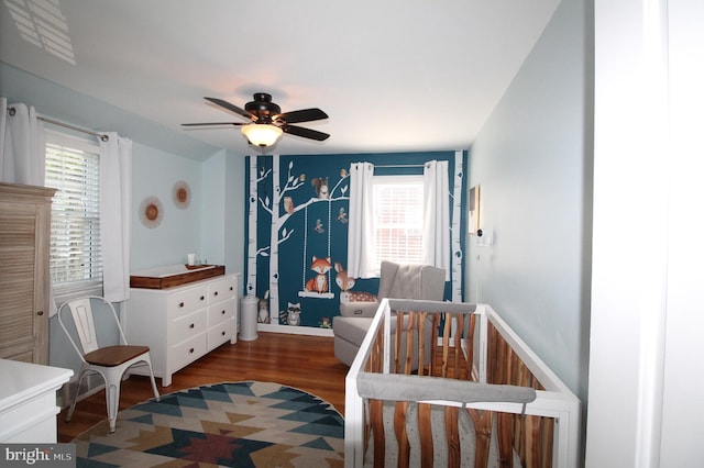 243 Pinehurst Rd, Wilmington, DE 19803 - bedroom featuring wood finished floors, a crib, and a ceiling fan
