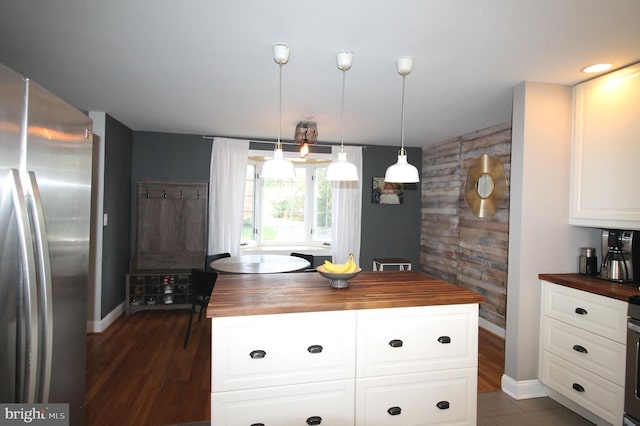 243 Pinehurst Rd, Wilmington, DE 19803 - kitchen with wood counters, freestanding refrigerator, white cabinets, and dark wood-type flooring