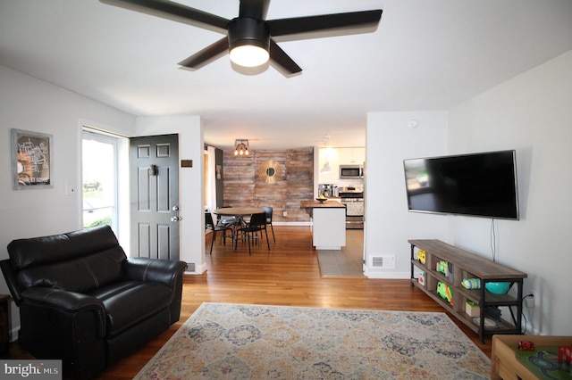 243 Pinehurst Rd, Wilmington, DE 19803 - living room featuring light wood finished floors and ceiling fan