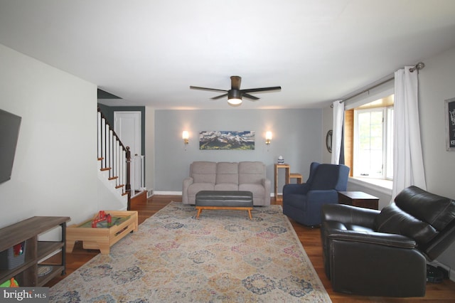 243 Pinehurst Rd, Wilmington, DE 19803 - living area with dark wood-style floors, stairs, and a ceiling fan