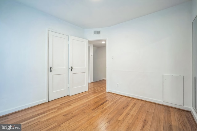 304 S Veitch St, Arlington, VA 22204 - unfurnished bedroom featuring light wood-style floors and baseboards