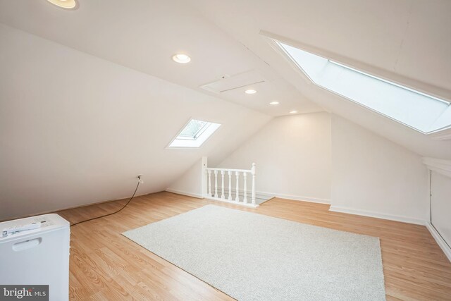 304 S Veitch St, Arlington, VA 22204 - bonus room featuring a skylight, light wood-style floors, lofted ceiling, and recessed lighting