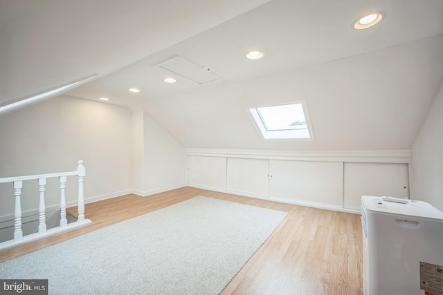 304 S Veitch St, Arlington, VA 22204 - bonus room featuring wood finished floors, vaulted ceiling, a skylight, and recessed lighting