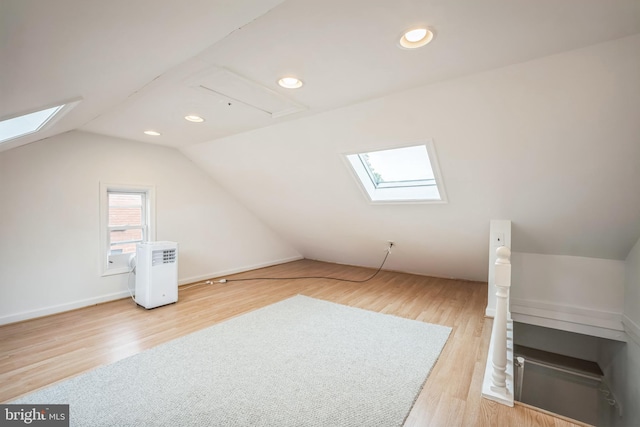 304 S Veitch St, Arlington, VA 22204 - bonus room with a skylight, vaulted ceiling, wood finished floors, and recessed lighting