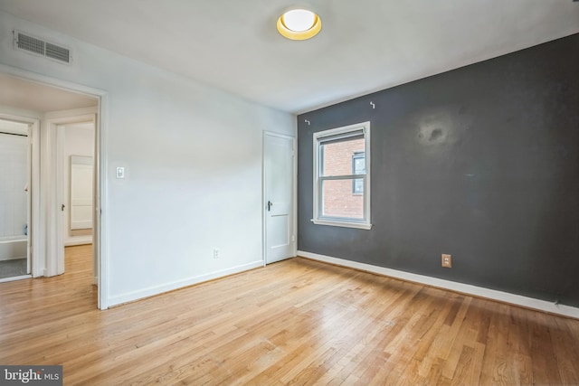 304 S Veitch St, Arlington, VA 22204 - spare room with light wood-type flooring and baseboards