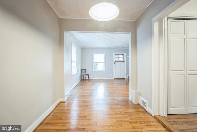 304 S Veitch St, Arlington, VA 22204 - hallway featuring light wood-type flooring and crown molding