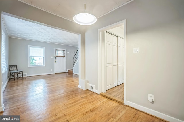 304 S Veitch St, Arlington, VA 22204 - empty room with crown molding, wood finished floors, and stairway