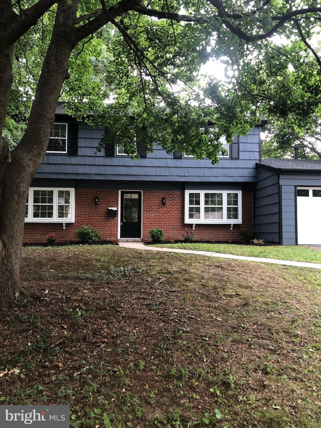 2302 Hanover Pl, Bowie, MD 20716 - view of front of house featuring brick siding and an attached garage