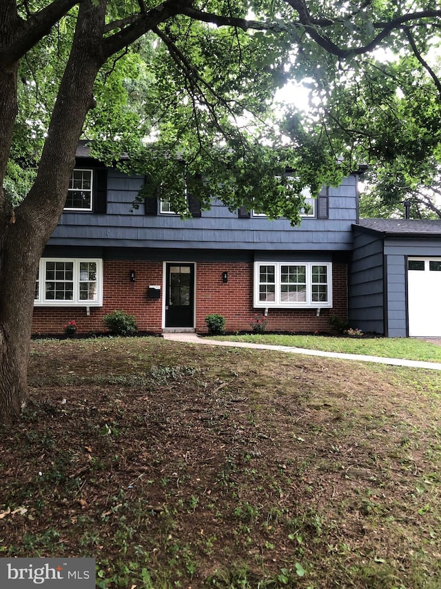 2302 Hanover Pl, Bowie, MD 20716 - view of front of house featuring brick siding and an attached garage