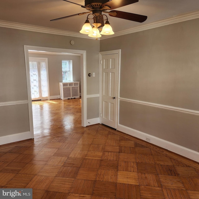 175 Stoneway Ln, Bala Cynwyd, PA 19004 - spare room with radiator, a ceiling fan, and crown molding