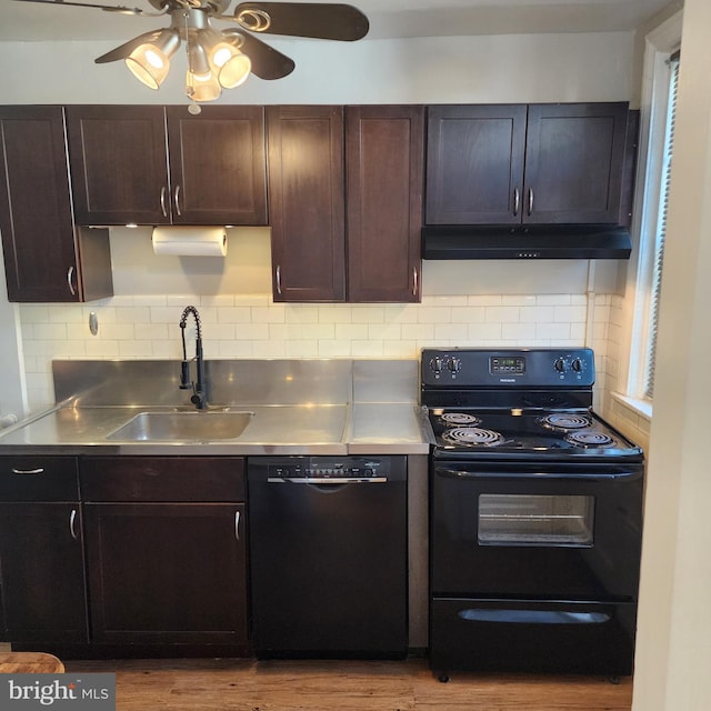 175 Stoneway Ln, Bala Cynwyd, PA 19004 - kitchen featuring black appliances, stainless steel counters, under cabinet range hood, ceiling fan, and wood finished floors