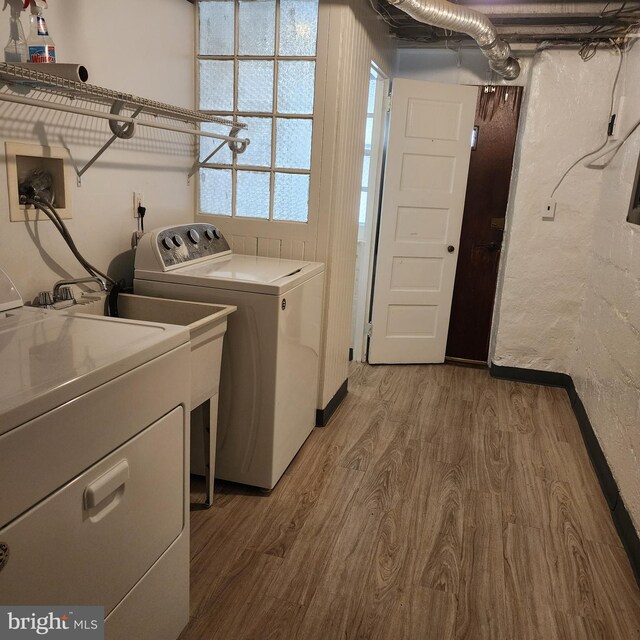 175 Stoneway Ln, Bala Cynwyd, PA 19004 - laundry area with separate washer and dryer and wood finished floors