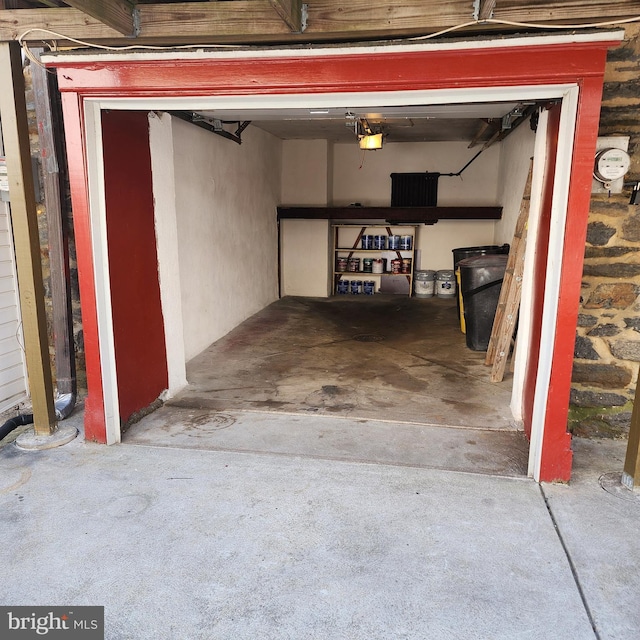 175 Stoneway Ln, Bala Cynwyd, PA 19004 - garage with a garage door opener and concrete driveway