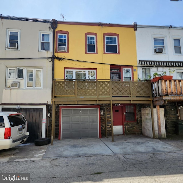 175 Stoneway Ln, Bala Cynwyd, PA 19004 - view of front of home with a garage, stucco siding, driveway, and cooling unit