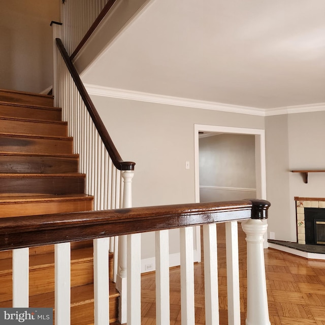 175 Stoneway Ln, Bala Cynwyd, PA 19004 - stairway featuring ornamental molding and a fireplace