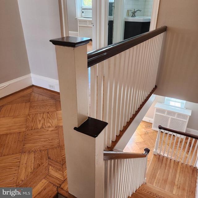 175 Stoneway Ln, Bala Cynwyd, PA 19004 - stairway featuring baseboards and parquet flooring