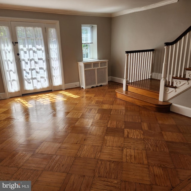 175 Stoneway Ln, Bala Cynwyd, PA 19004 - entryway with radiator heating unit, stairs, and crown molding