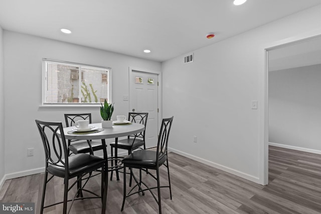 1072 Lakeshore Dr, Camden, NJ 08104 - dining area with recessed lighting and wood finished floors