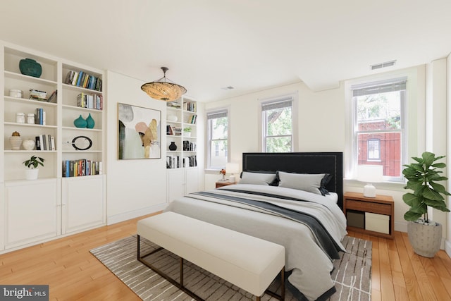 1513 Swann St NW, Washington, DC 20009 - bedroom featuring light wood-type flooring and baseboards