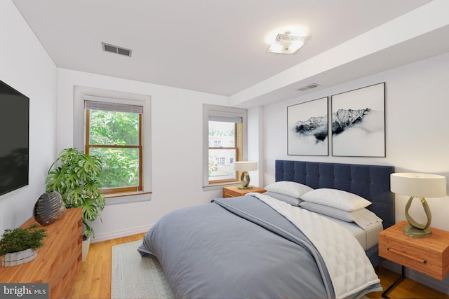 1513 Swann St NW, Washington, DC 20009 - bedroom with wood finished floors and baseboards