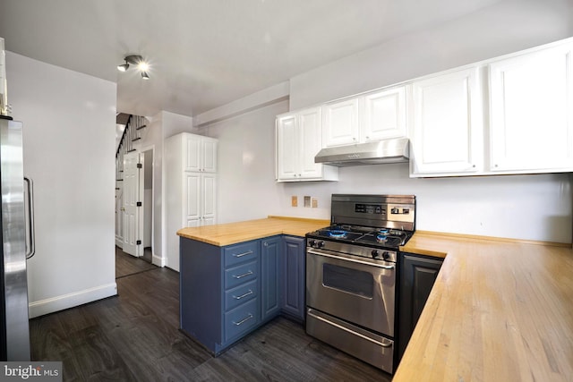 1513 Swann St NW, Washington, DC 20009 - kitchen with wooden counters, appliances with stainless steel finishes, under cabinet range hood, and dark wood-style flooring