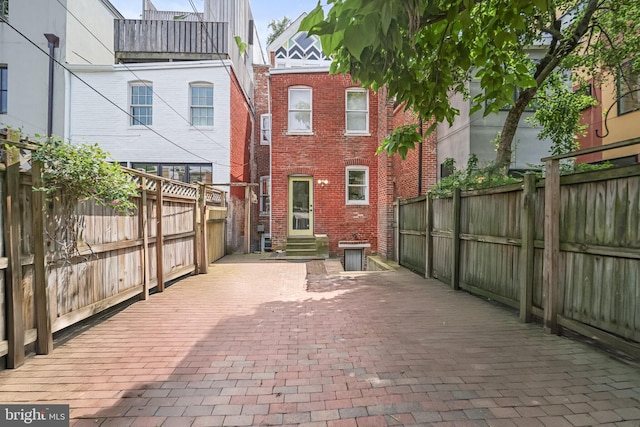 1513 Swann St NW, Washington, DC 20009 - fenced backyard featuring entry steps