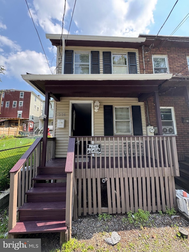 226 E Snyder Ave, Lansford, PA 18232 - view of property with covered porch and brick siding