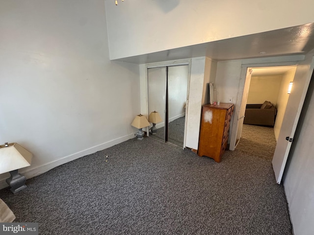 226 E Snyder Ave, Lansford, PA 18232 - unfurnished bedroom with carpet flooring, a closet, and a towering ceiling