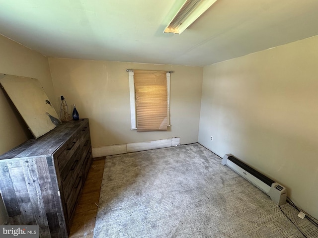 226 E Snyder Ave, Lansford, PA 18232 - carpeted empty room featuring a baseboard heating unit