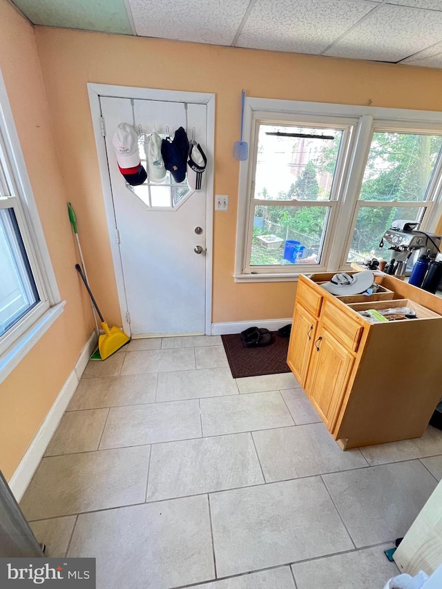 7033 Gillespie St, Philadelphia, PA 19135 - doorway featuring baseboards and light tile patterned floors