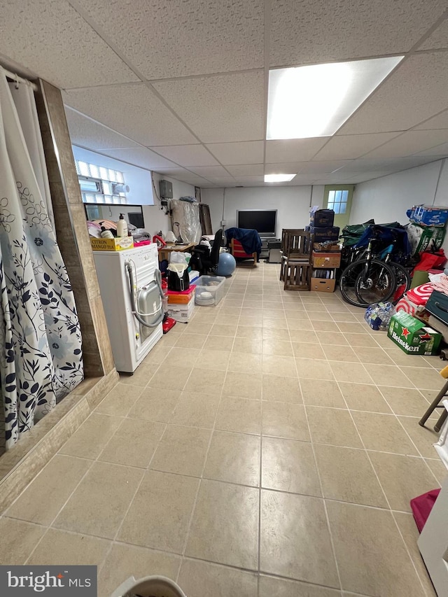 7033 Gillespie St, Philadelphia, PA 19135 - basement with washer / dryer, tile patterned floors, and a drop ceiling