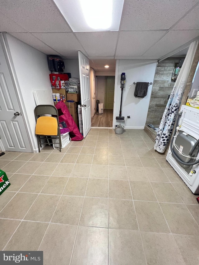 7033 Gillespie St, Philadelphia, PA 19135 - finished below grade area with a drop ceiling and tile patterned flooring