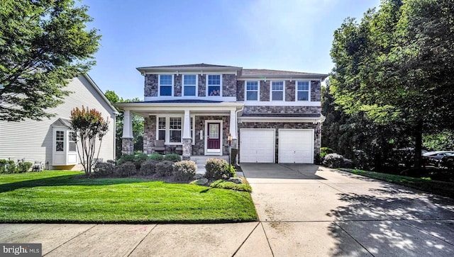 1901 Eamons Way, Annapolis, MD 21401 - view of front facade with stone siding, a garage, concrete driveway, a porch, and a front yard